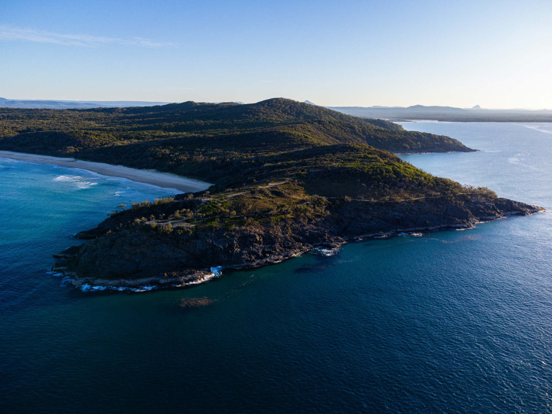 Aerial view over Noosa headland and ocean